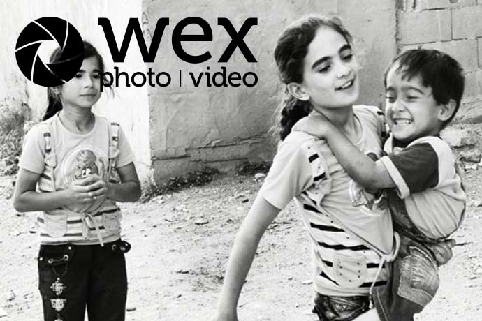 Leo White looks at how Giles’ photography invites people to see who they are, not just what they’ve been through.