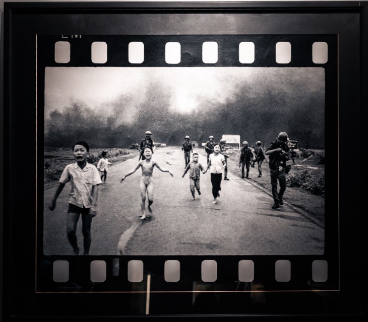 A powerful photograph displayed at the War Remnants Museum in Ho Chi Minh City (Saigon), depicting the iconic image from the Vietnam War known as 'The Napalm Girl.' Saigon, Vietnam, 08.08.2024